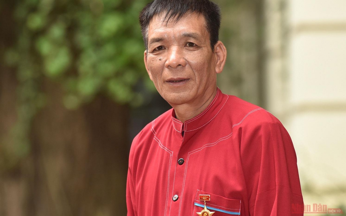 Cựu binh Thăng Văn Báo, người dân tộc Sán Dìu, trưởng thôn Muối, xã Giáp Sơn, huyện Lục Ngạn, tỉnh Bắc Giang