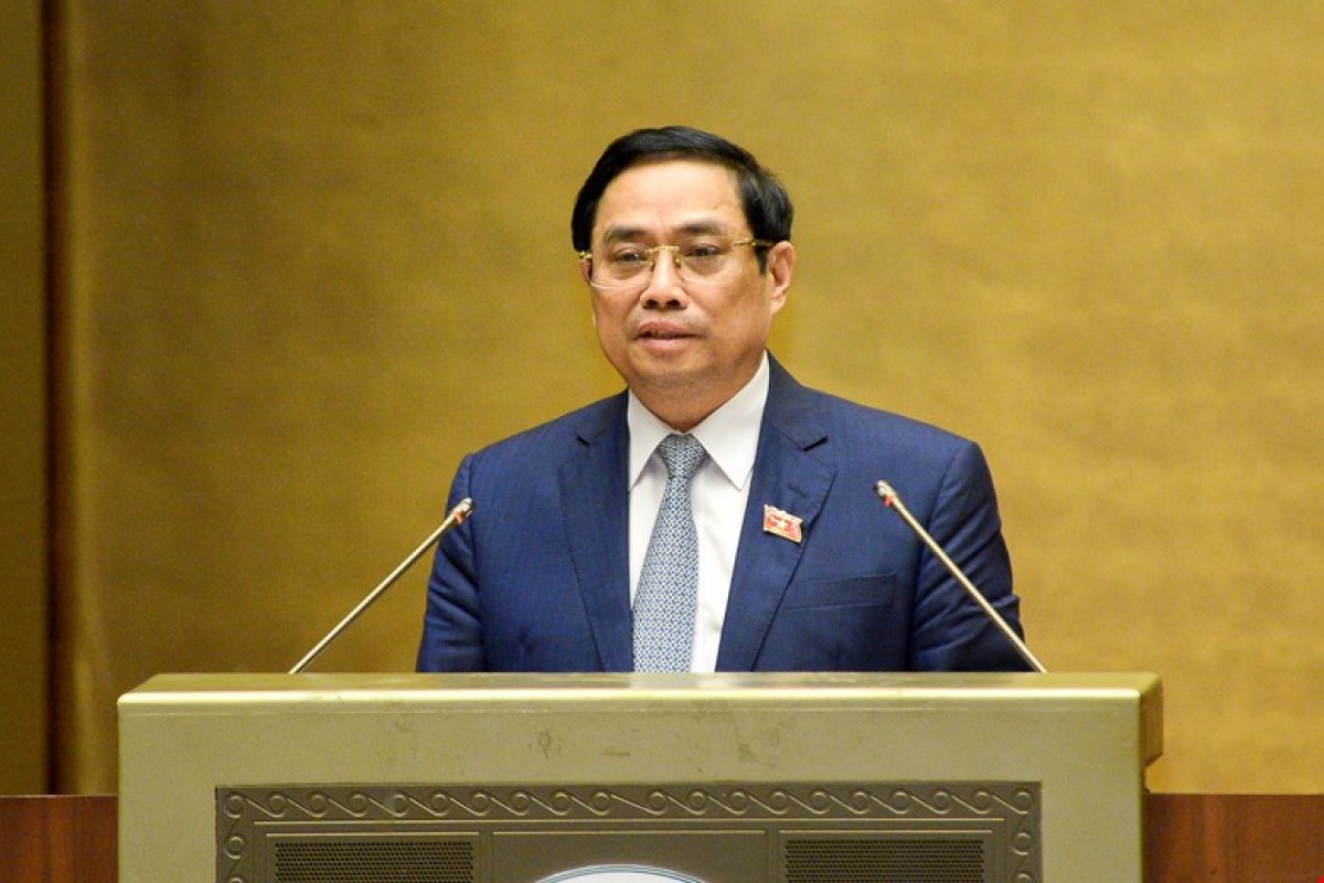 Thủ tướng Chính phủ Phạm Minh Chính trình bày Tờ trình tóm tắt về cơ cấu tổ chức của Chính phủ nhiệm kỳ 2021-2026, sáng 22/7