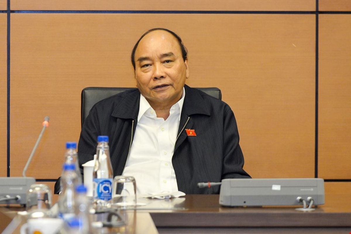 Chủ tịch nước Nguyễn Xuân Phúc đóng góp ý kiến tại phiên thảo luận tổ ngày 20/10 (Ảnh: QH)