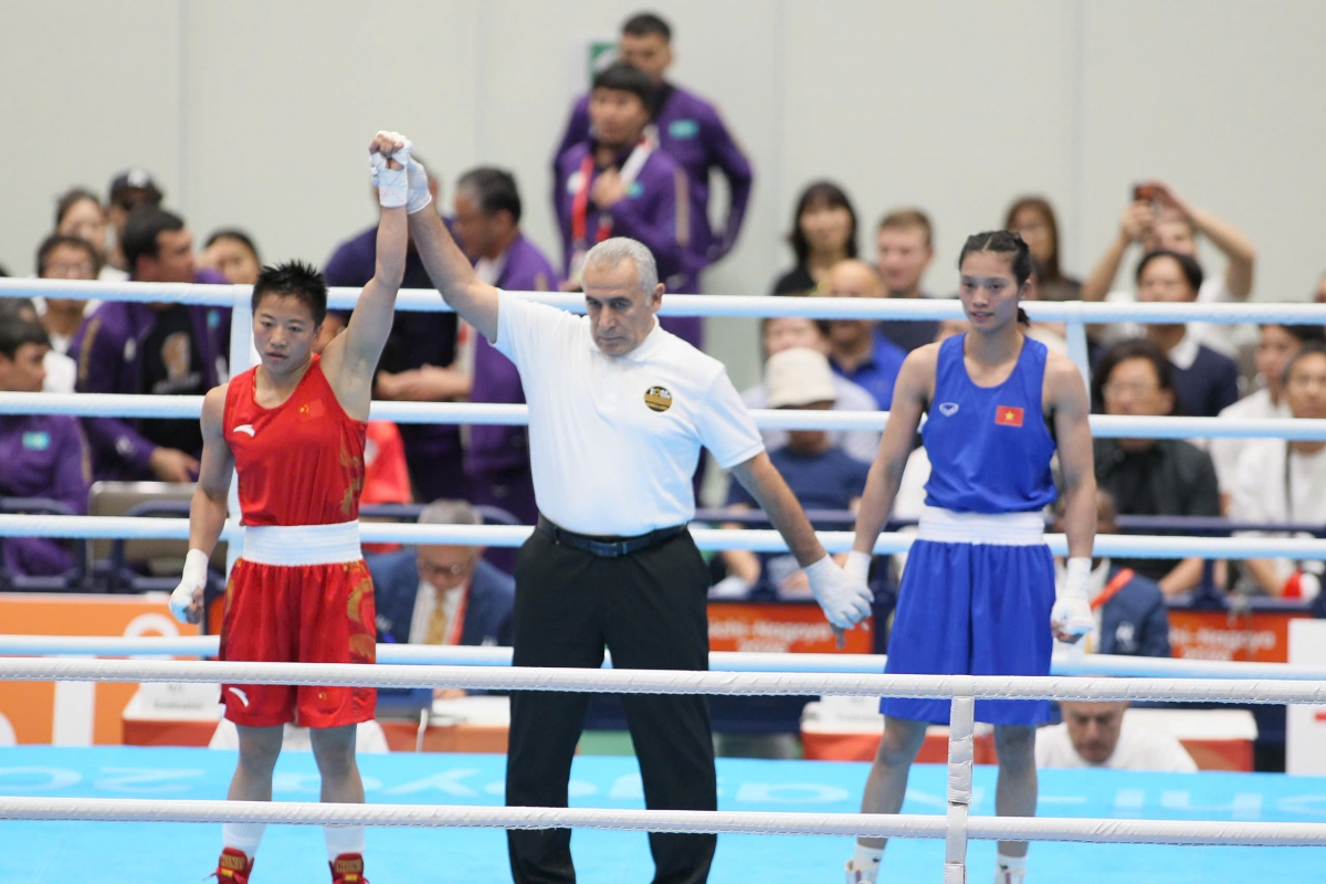 Nguyễn Thị Tâm không thể vượt qua nhà đương kim vô địch Olympic (Ảnh: Quý Lượng)